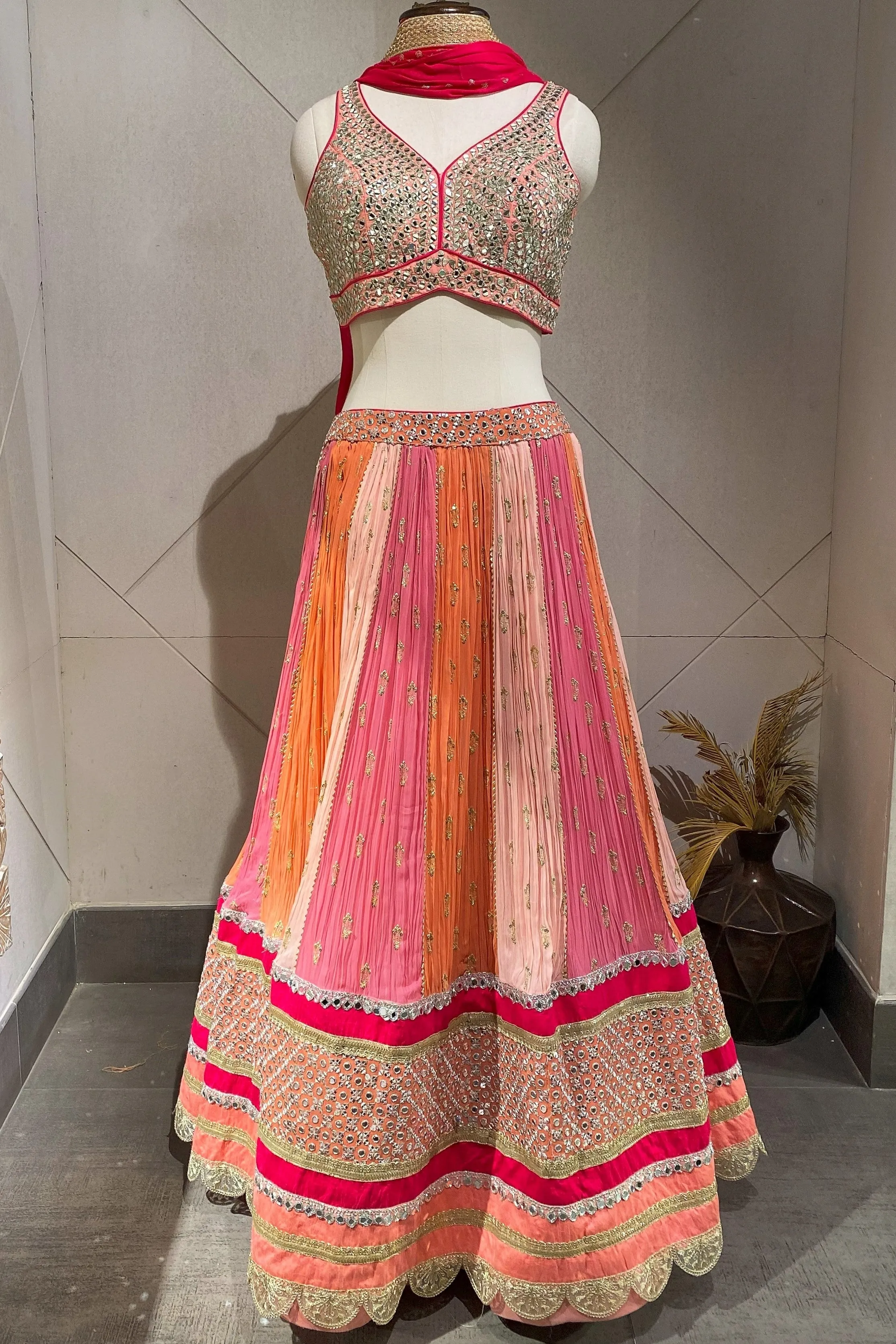 310058 Peach Lehnga With Mirror Work Embroidery