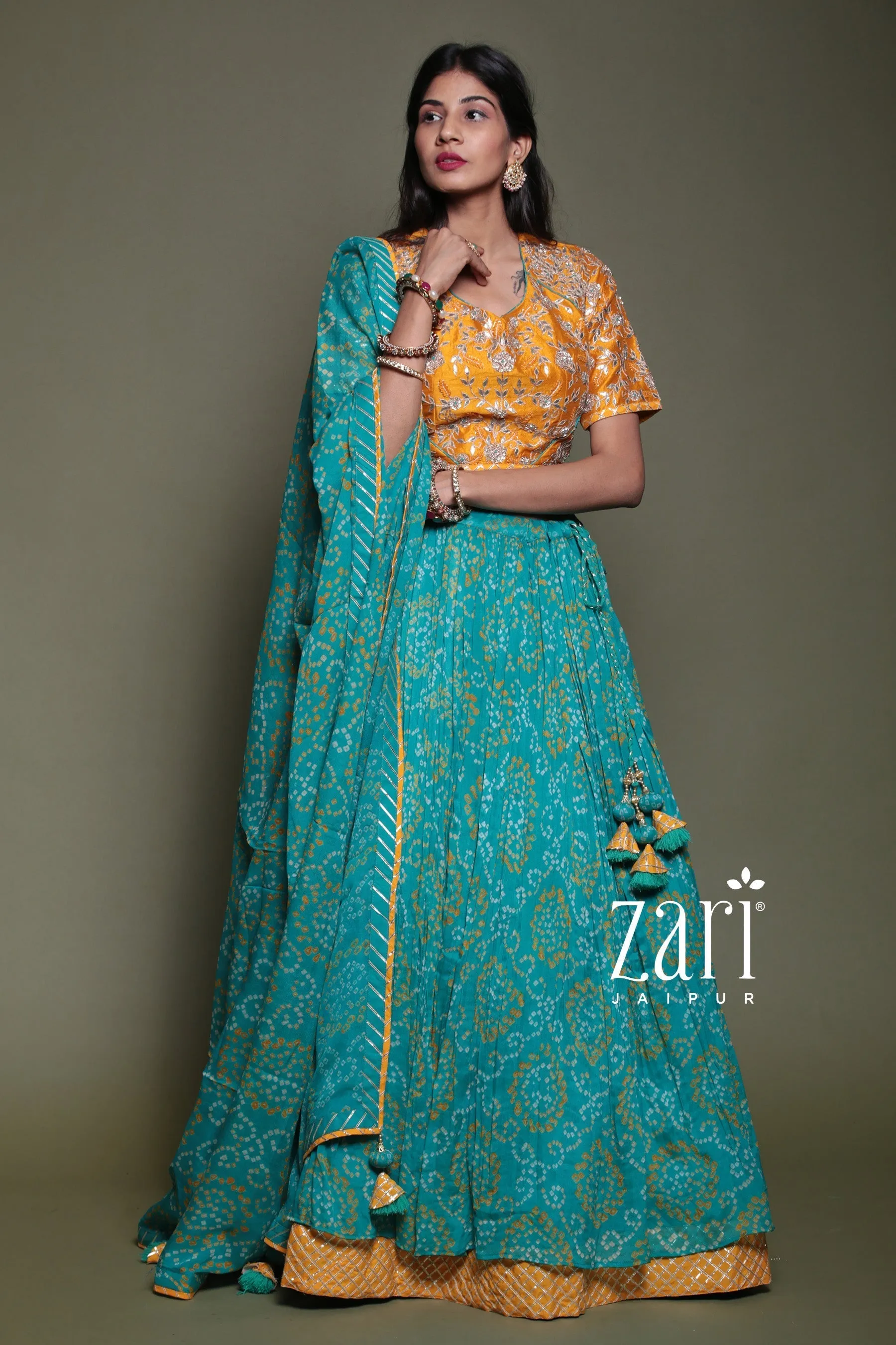 Bandhej Chinon silk Lehenga with Aari, Gota Patti, Sequins, Thread, Zardozi work.