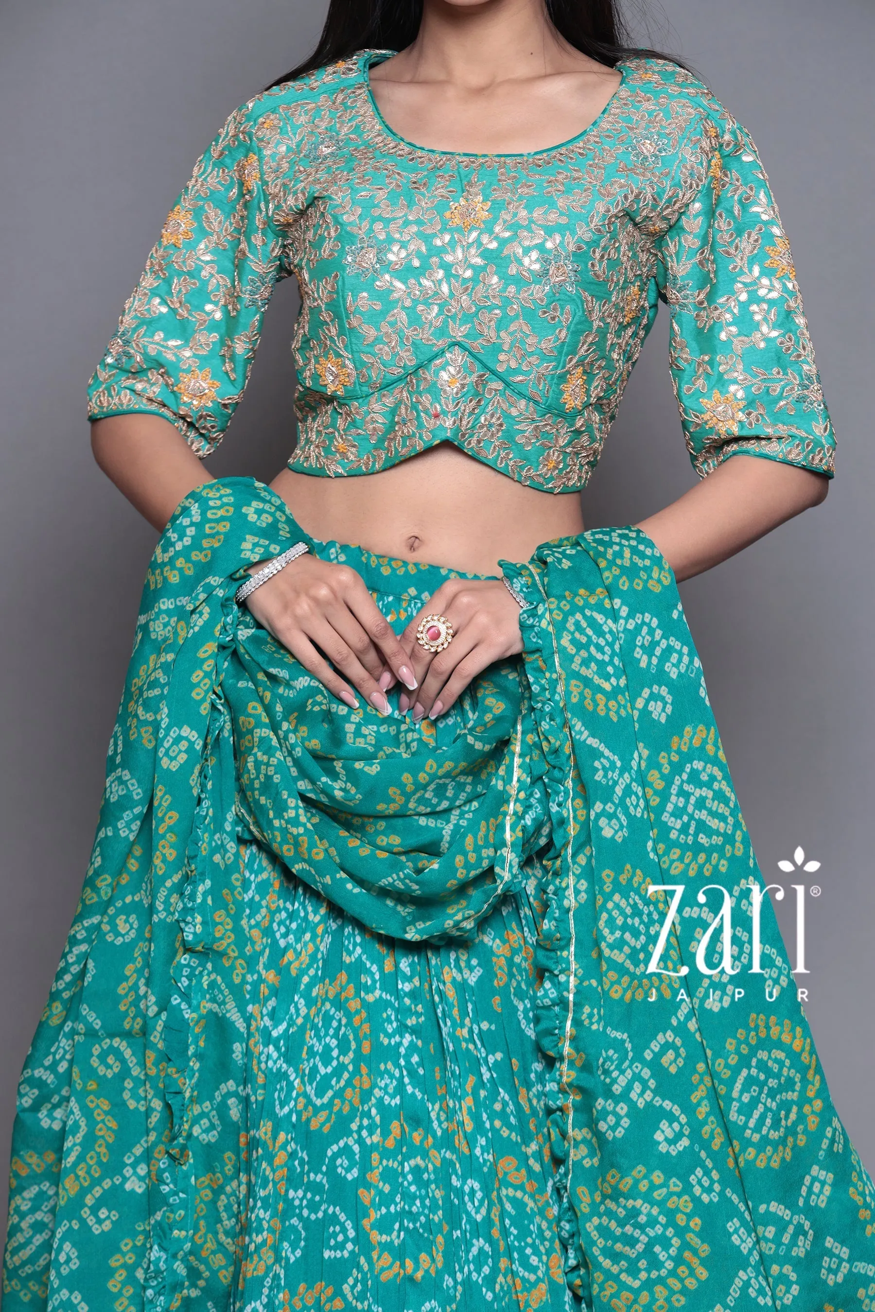 Bandhej Chinon silk  Lehenga with Aari, Gota Patti, Sequins, Thread, Zardozi work.