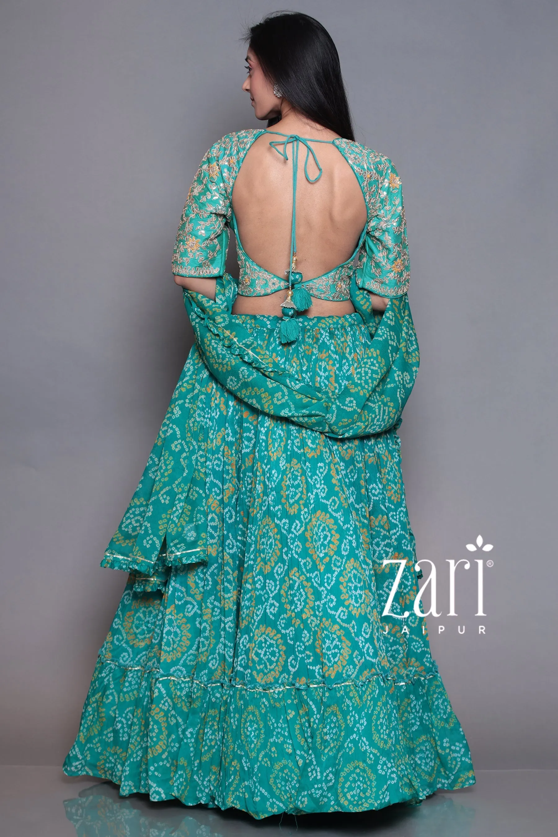 Bandhej Chinon silk  Lehenga with Aari, Gota Patti, Sequins, Thread, Zardozi work.