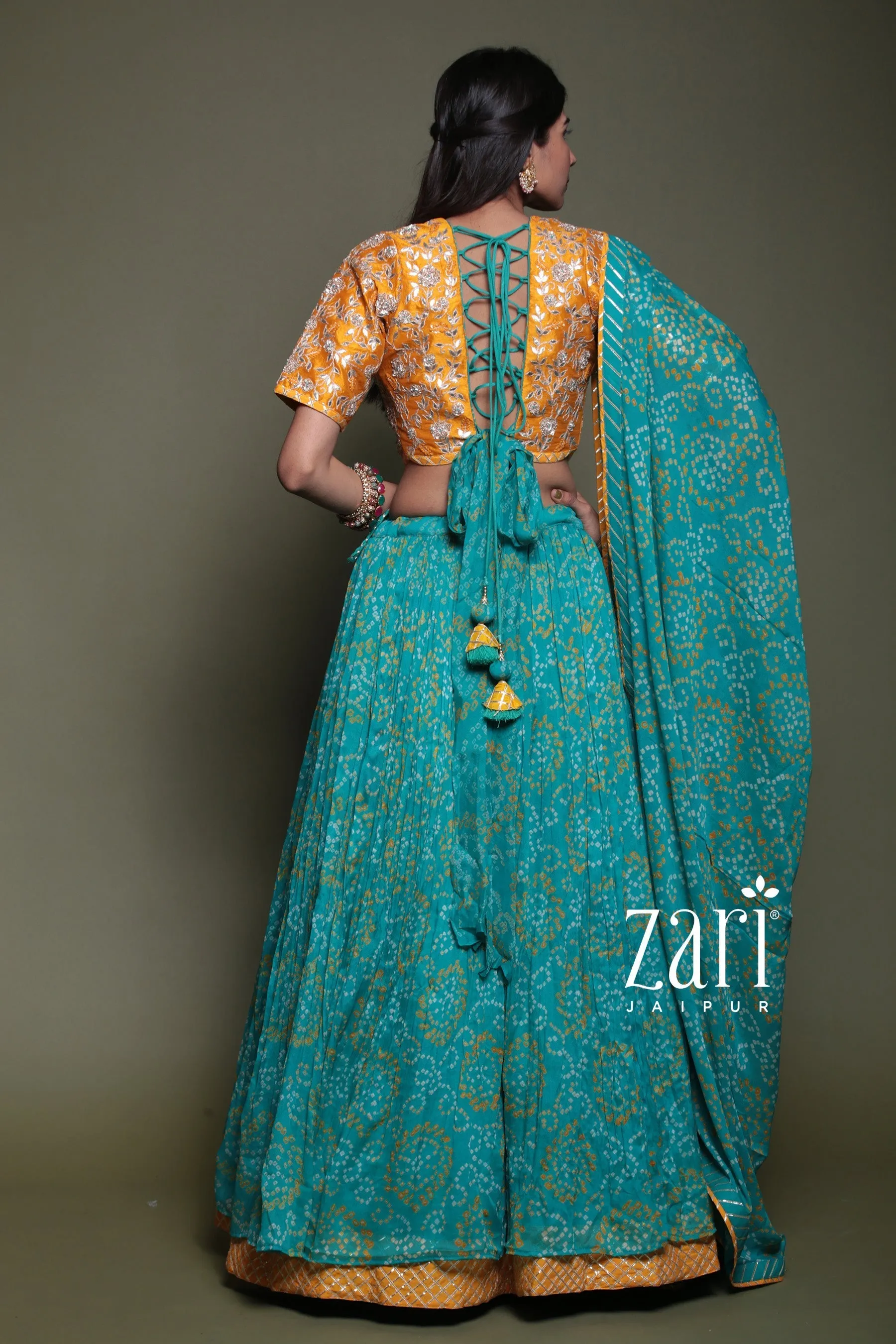 Bandhej Chinon silk Lehenga with Aari, Gota Patti, Sequins, Thread, Zardozi work.