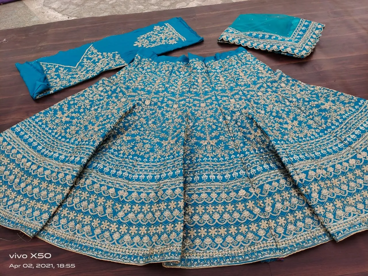 MALAI-SATIN-EMBROIDERY-LEHENGA-IN-BLUE-COLOUR