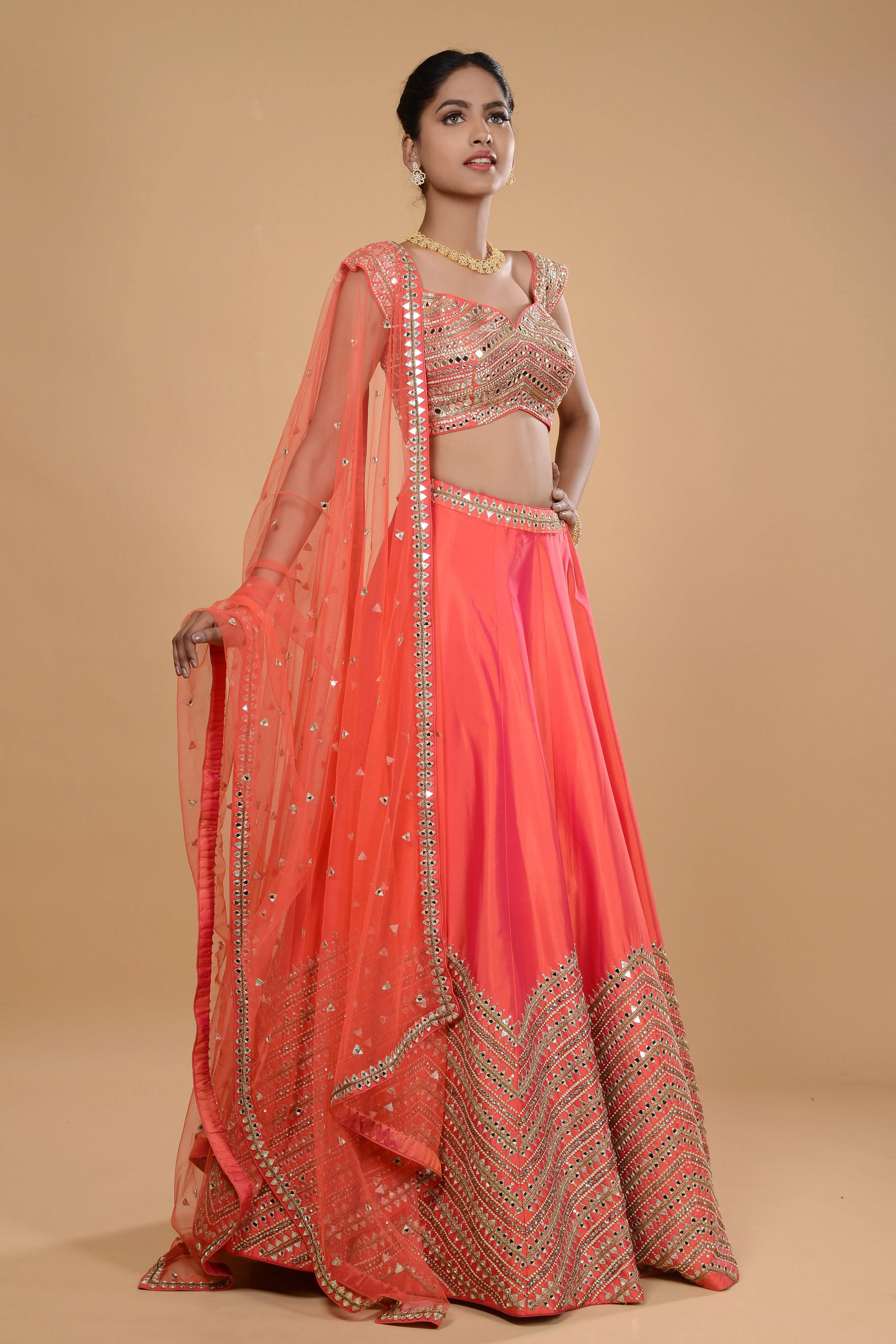 Orange Lehenga Set.