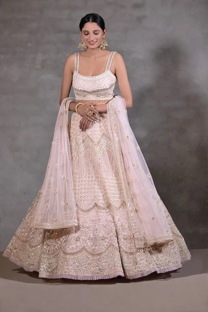 Powder pink lehenga set.