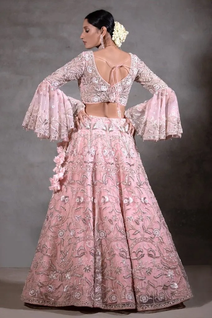 Soft pink peplum Lehenga set.